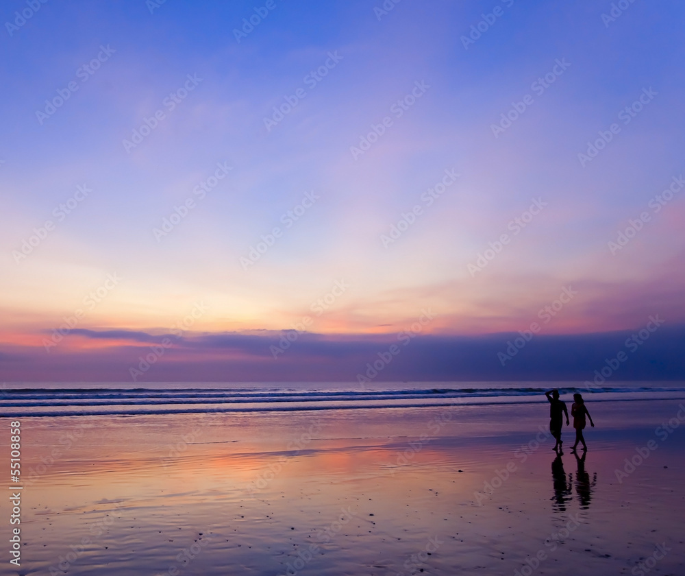 Silhouette of couple at sunset