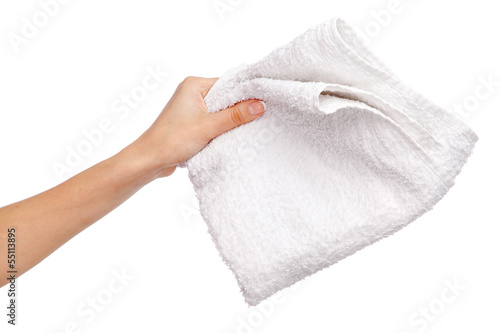 Female hand holding a white towel