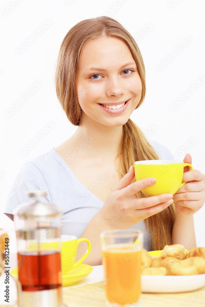 Beautiful young woman drinking tea Beautiful young woman drinking tea
