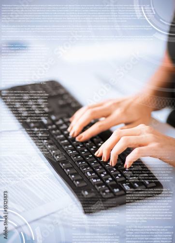 woman hands typing on keyboard