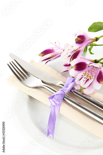 Fototapeta Naklejka Na Ścianę i Meble -  Festive dining table setting with flowers isolated on white