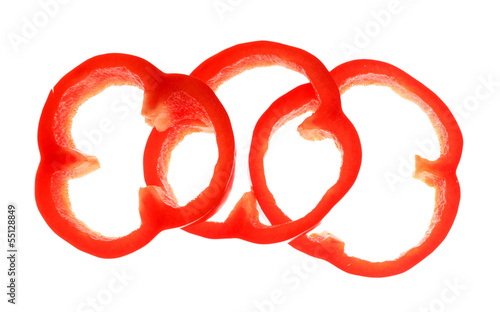 Fresh red pepper slices isolated on white
