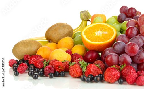 Fresh fruits and berries isolated on white