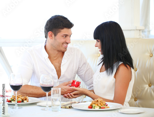 Beautiful couple having  romantic dinner at restaurant