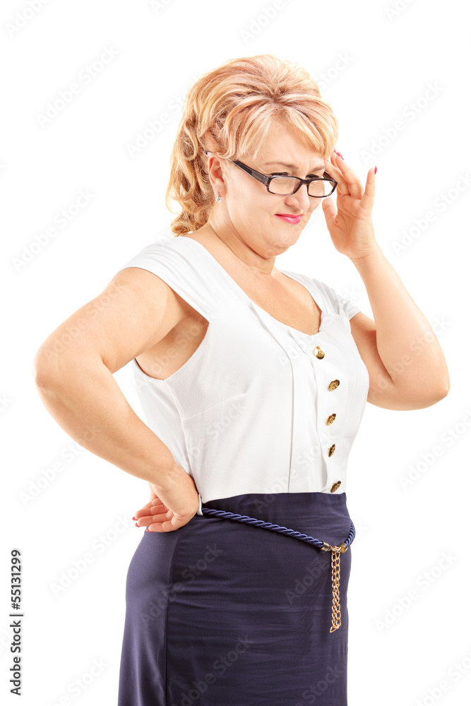 Middle aged blond woman having a headache Middle aged blond woman having a headache