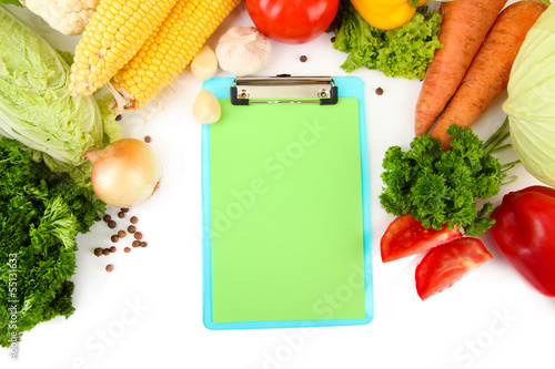 Fresh vegetables and spices and paper for notes, isolated