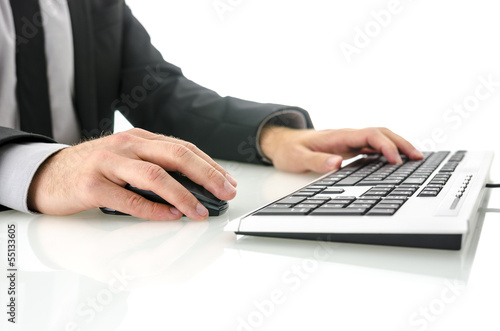 Side view of business man using computer