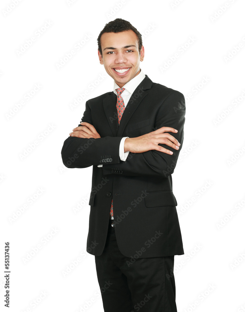 Handsome young business man standing with folded arms Handsome young business man standing with folded arms