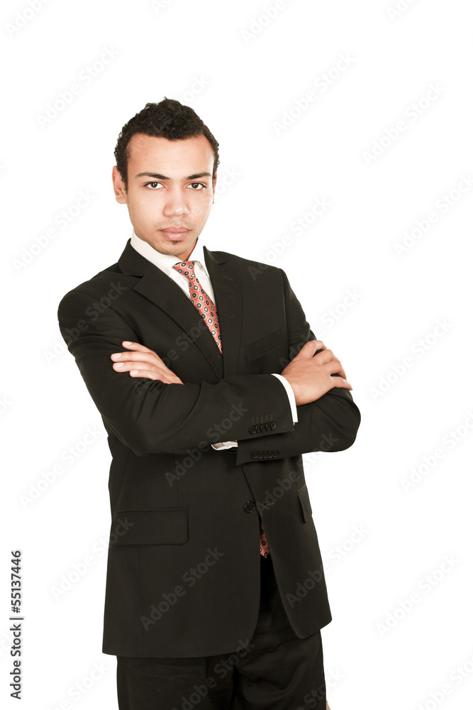 Handsome young business man standing with folded arms Handsome young business man standing with folded arms