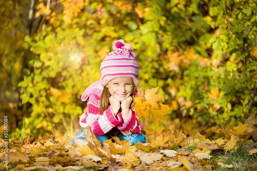 Autumn portrait of a little girl