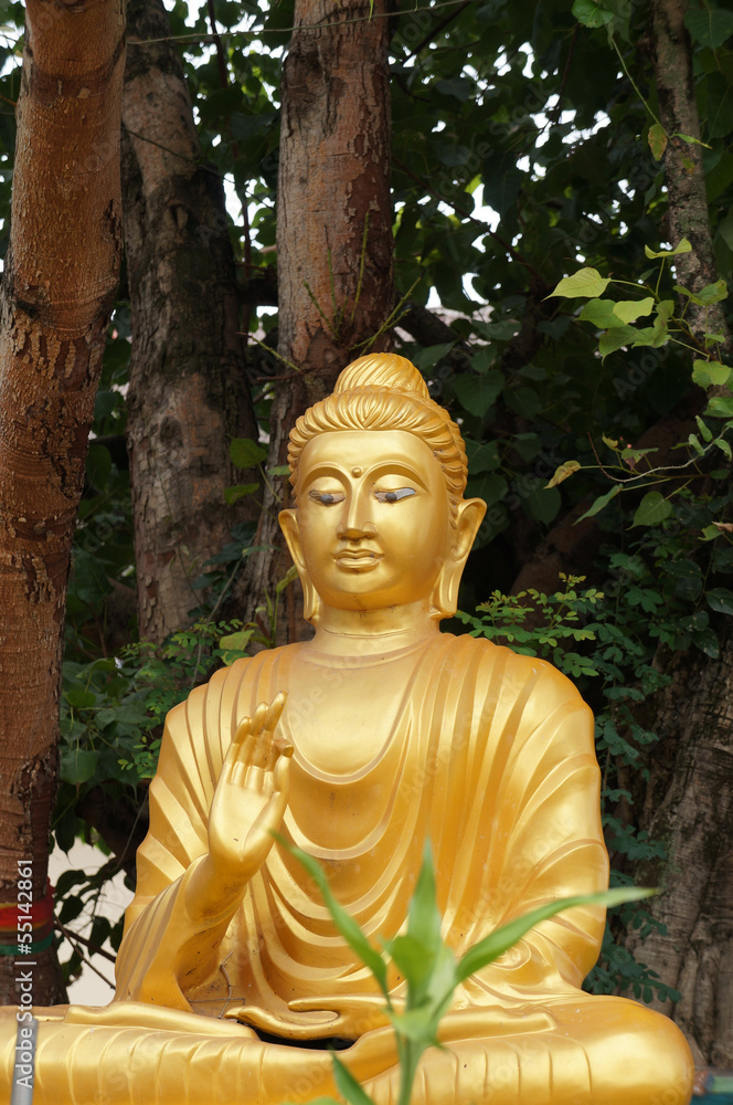 Golden buddha statue in a temple in Udon Thani Golden buddha statue in a temple in Udon Thani