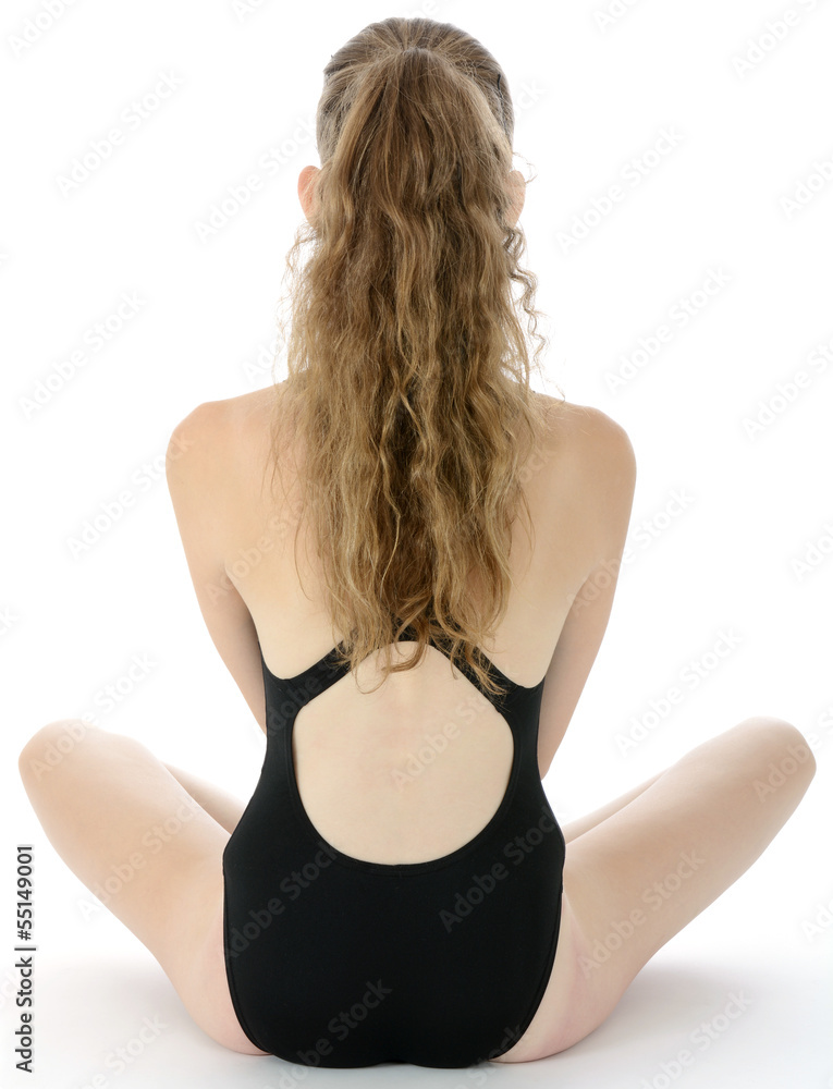 Teenager im Badeanzug sitzt Stock Photo | Adobe Stock