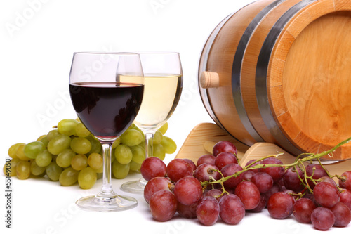 Grape on the barrel, glasses of wine photo