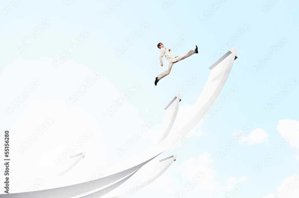 Businessman jumping