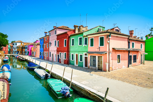Venice landmark, Burano canal, houses and boats, Italy © stevanzz