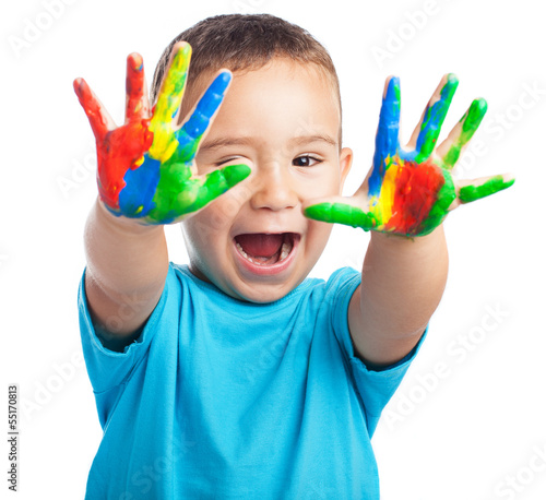 cheerful child with painted hands on white background