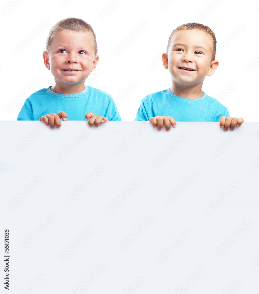 children behind a billboard with a blue t-shirt on a white backg children behind a billboard with a blue t-shirt on a white backg