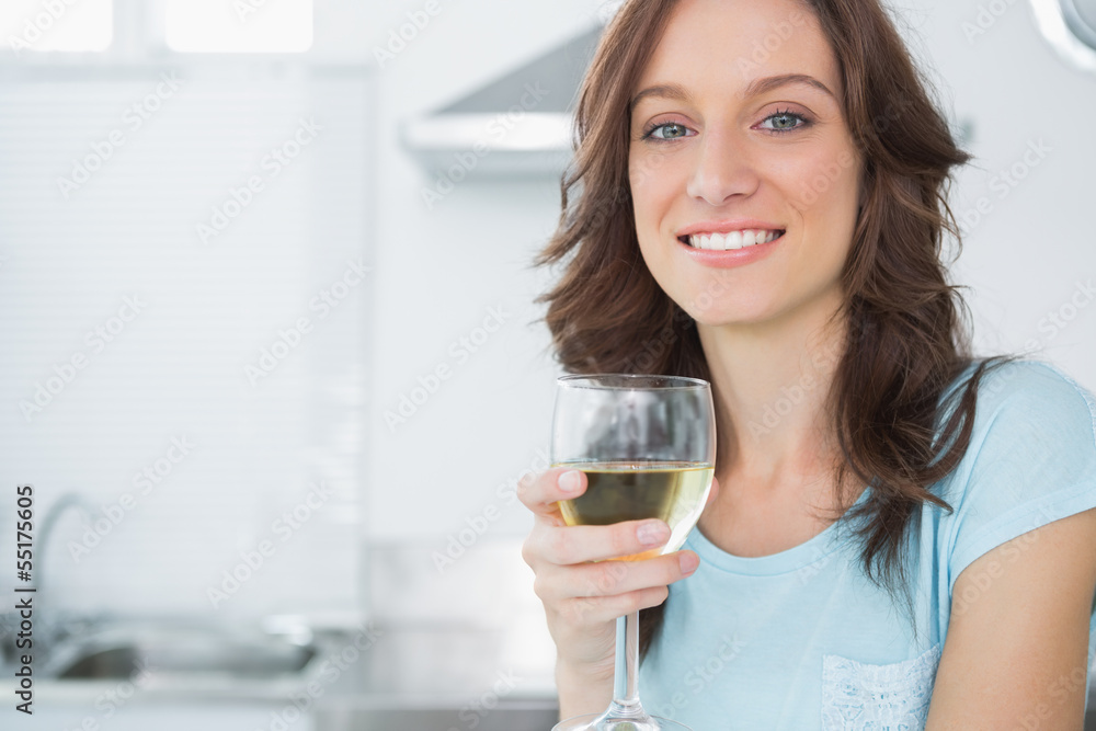 Pretty brunette having a glass of wine Pretty brunette having a glass of wine