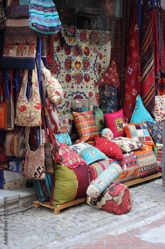 Fabrics, textiles,bags and turkish rugs at a bazaar in Turkey © markim
