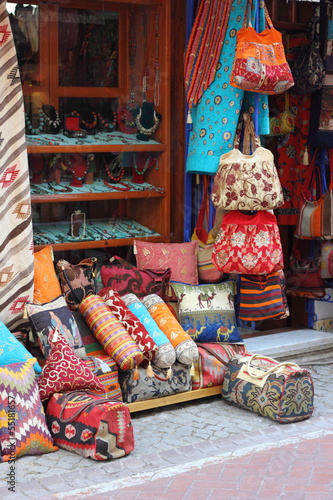 Fabrics, textiles,bags and turkish rugs at a bazaar in Turkey © markim