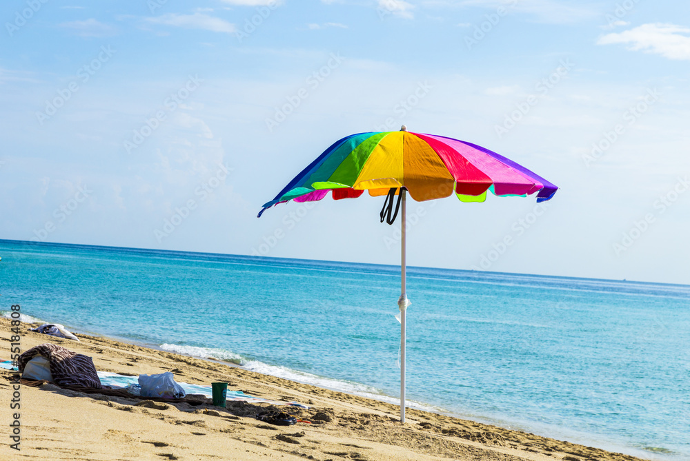 beach umbrella colorful in the sand