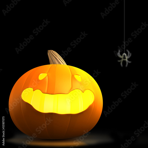 Halloween Pumpkin with Spider in black background © rakchai