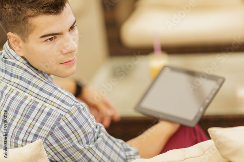 Young man with tablet