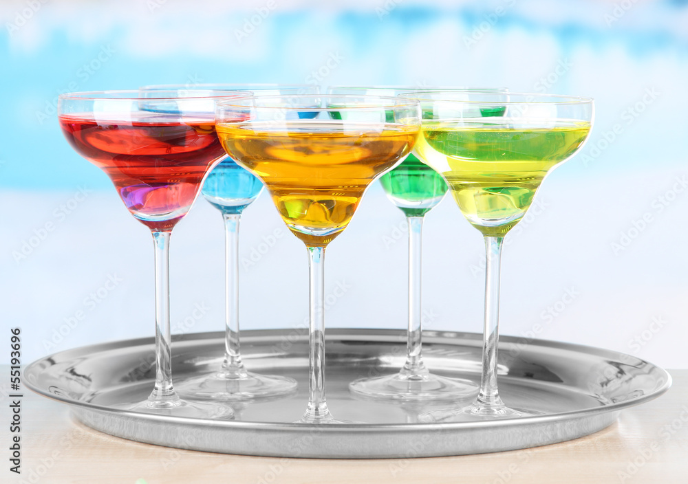 Different cocktails on bright background Different cocktails on bright background