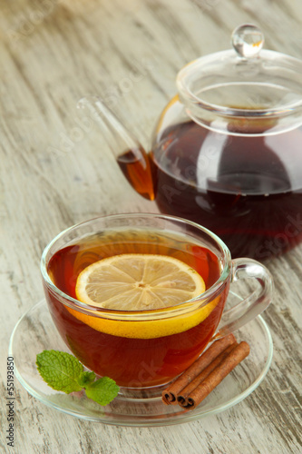 Cup of tea with lemon on table close-up