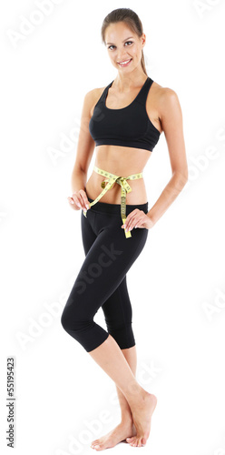 Young woman with measuring ...