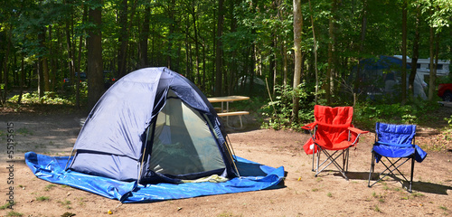 Campsite with chairs and tent