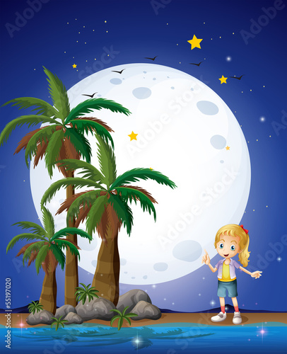 A girl at the beach under the bright fullmoon