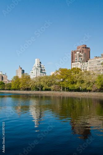 Central Park Lake and buildings in New York City, USA