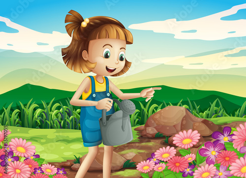 A little woman watering the plants