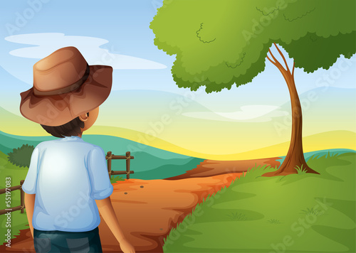 A backview of a young farmer