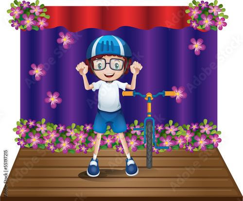 A stage with a biker at the center