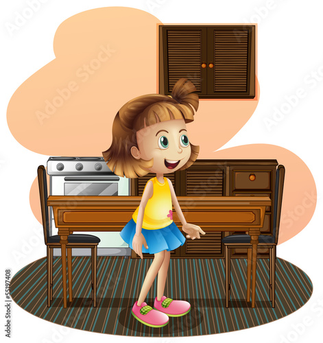 A little girl in the kitchen wearing a blue skirt