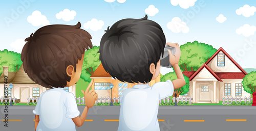 Two young men with a camera