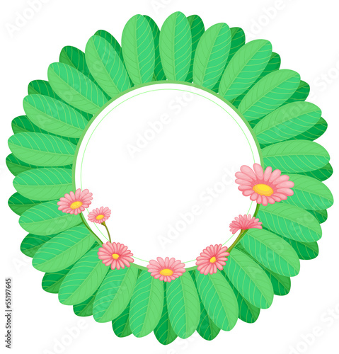 A green leafy border with pink flowers