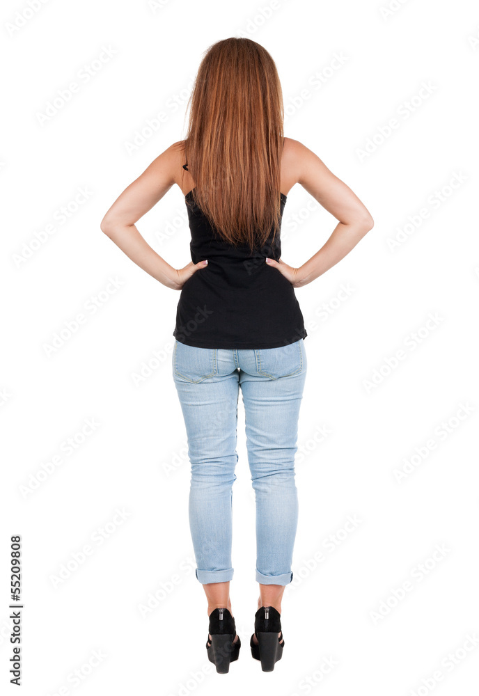 back view of standing young beautiful redhead woman. back view of standing young beautiful redhead woman.