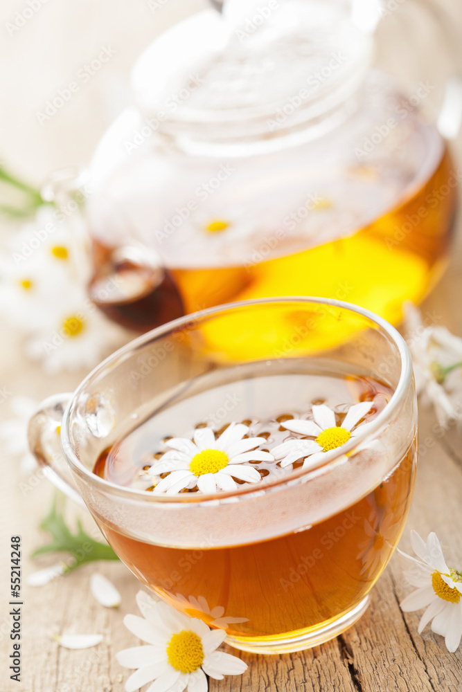 cup of herbal tea with chamomile flowers cup of herbal tea with chamomile flowers