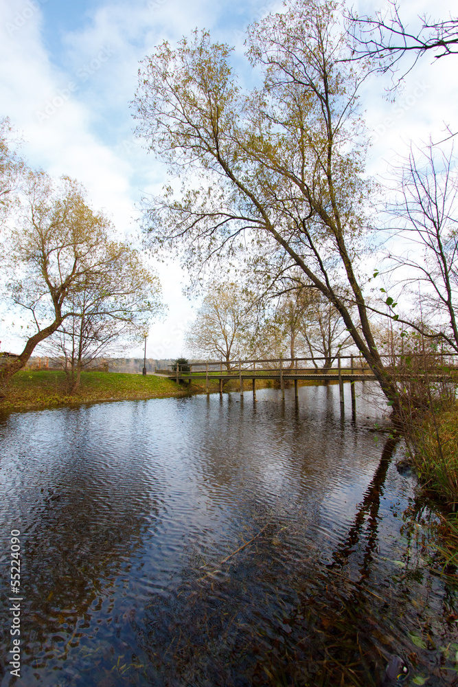 Autumn landscape with a river and trees Autumn landscape with a river and trees