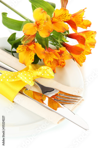 Fototapeta Naklejka Na Ścianę i Meble -  Festive dining table setting with flowers isolated on white