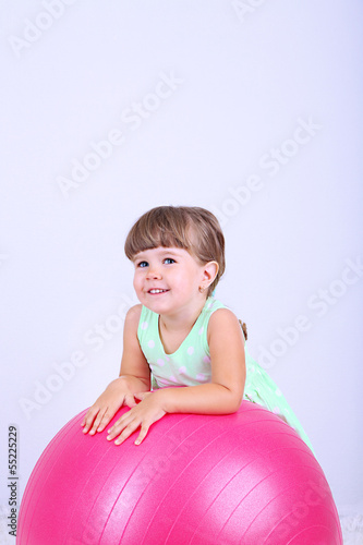 Little cute girl playing wi...