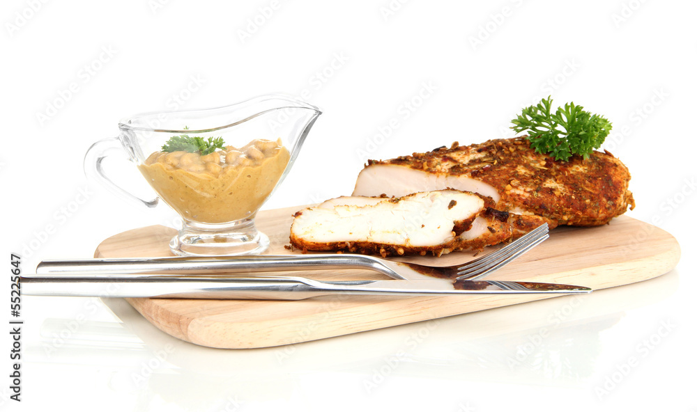 Roasted chicken fillets on wooden board, isolated on white Roasted chicken fillets on wooden board, isolated on white