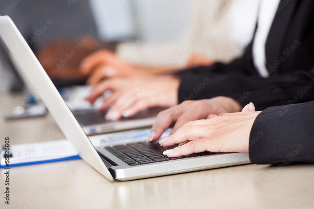 Group Of Businesspeople Working Together Group Of Businesspeople Working Together