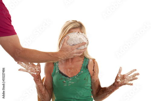 Woman with a pie in her face