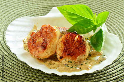 Seared scallops with creamy herb butter sauce