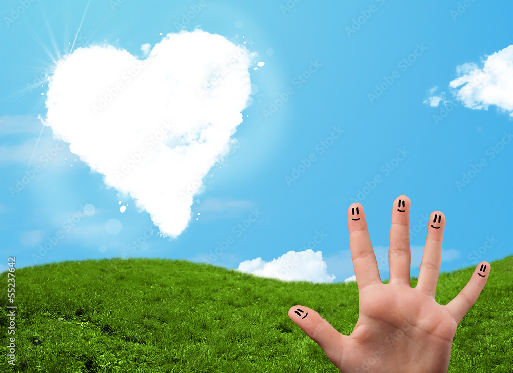 Happy smiley fingers looking at heart shaped cloud