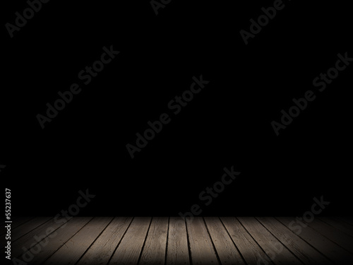 wood floor passing into darkness
